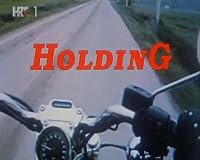 Holding poster